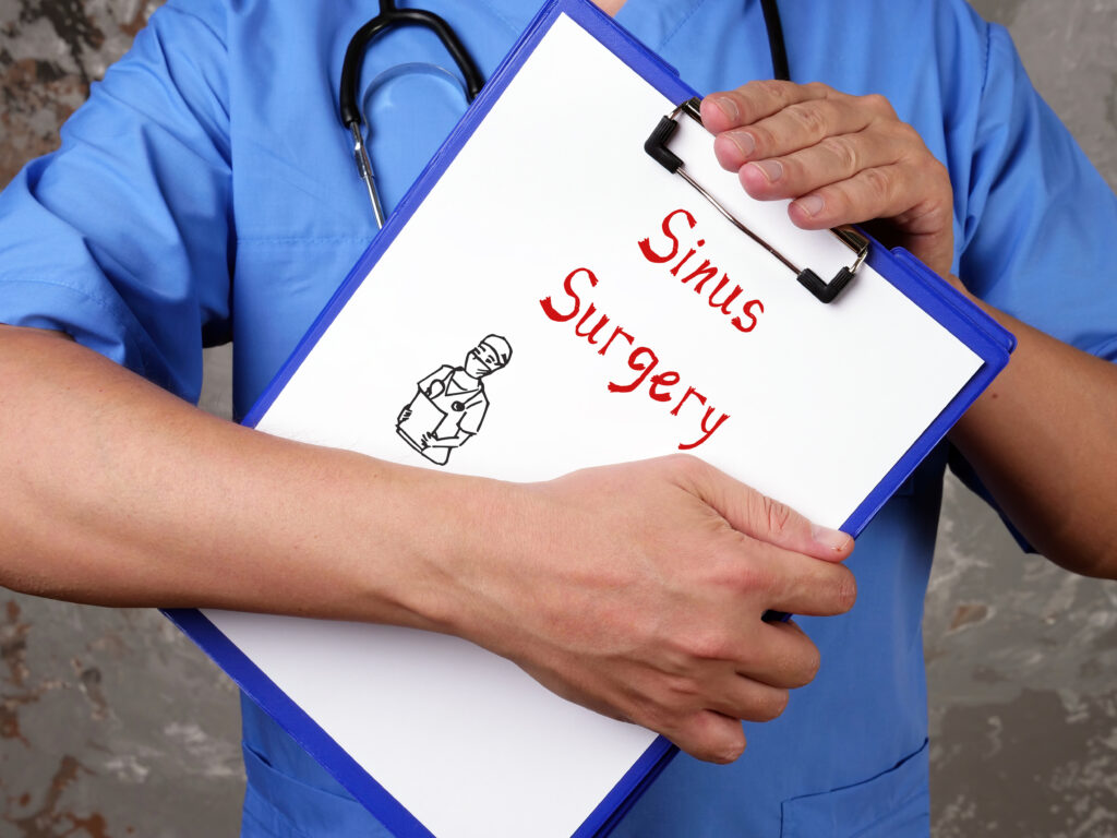 A doctor holding a clipboard reading "Sinus Surgery"